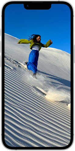 Färgstarka blommor visas på Super Retina XDR-skärmen på en iPhone 16e